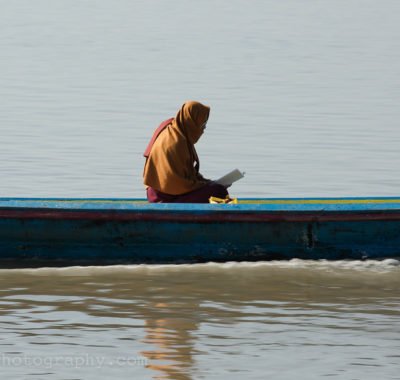 Monk in a boat
