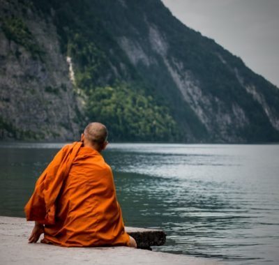 Monk near a river